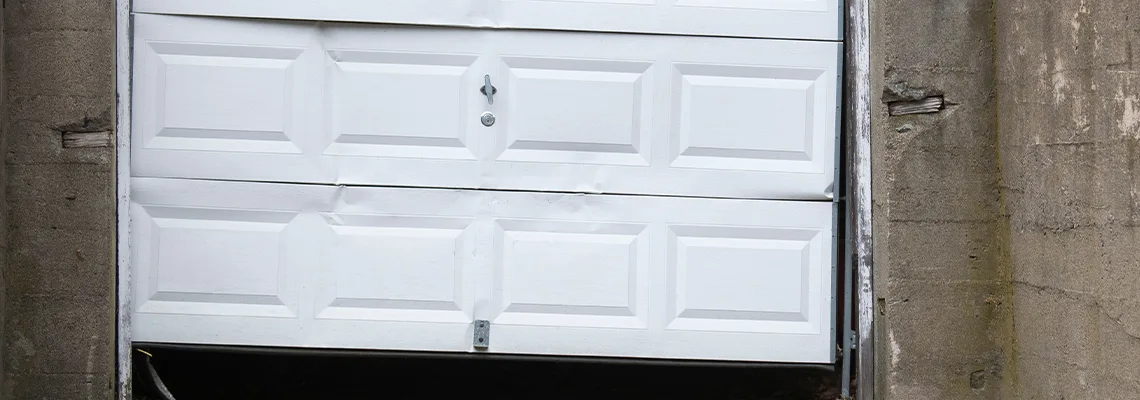 Garage Door Got Hit By A Car Dent Removal in Galesburg, IL