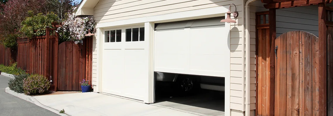 Fix Metal Garage Door Jerking in Galesburg, Illinois